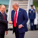 All smiles as Donald Trump greets Vladimir Putin in Anchorage, Alaska, ahead of a meeting last year. Picture: Andrew Harnik
