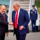 All smiles as Donald Trump greets Vladimir Putin in Anchorage, Alaska, ahead of a meeting last year. Picture: Andrew Harnik