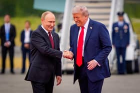 All smiles as Donald Trump greets Vladimir Putin in Anchorage, Alaska, ahead of a meeting last year. Picture: Andrew Harnik