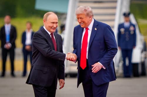 All smiles as Donald Trump greets Vladimir Putin in Anchorage, Alaska, ahead of a meeting last year. Picture: Andrew Harnik