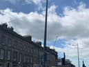 A lorry reversed into a lamp post which is now leaning against the supporting wires of the overhead line at Atholl Place in Edinburgh (Photo: Edinburgh Trams)