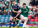 Jackson Irvine, playing for Ross County, battles with former Hibs midfielder John McGinn during the Highand side's victory over the Leith club in the 2016 League Cup final. Photo by Craig Foy/SNS Group