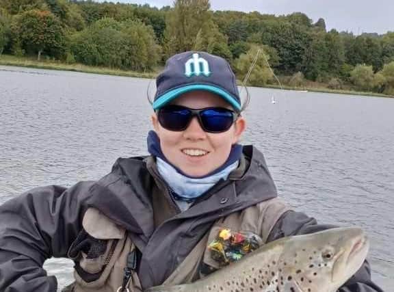 Edinburgh-based nurse Sam Hayhurst with a cracking brown trout estimated at between 12lb and 15lb tempted by a black humongus at Linlithgow Loch while fishing with the Dunfermline Artisans Club.