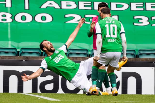 Christian Doidge celebrates his equaliser with Martin Boyle