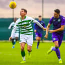Ben Stirling keeps a close eye on striker Patryk Klimala in a meeting between Celtic and Hibs earlier this year