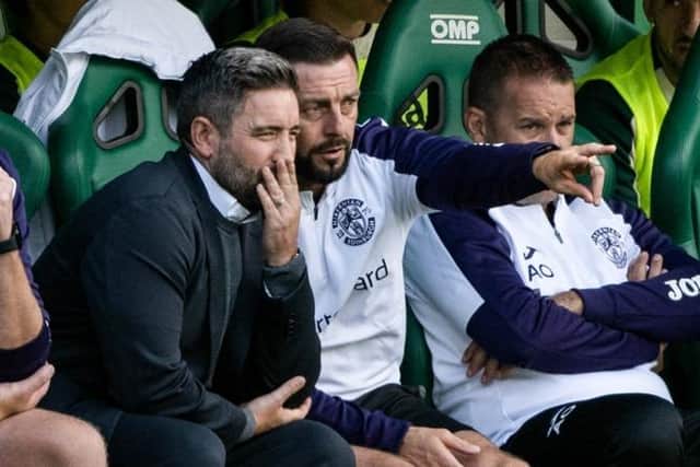 Hibs manager Lee Johnson with assistant boss Jamie McAllister during the loss to St Mirren at Easter Road. Picture: SNS