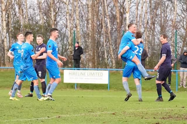 Newtongrange Star players celebrate after picking up a massive three points in their battle to beat the drop