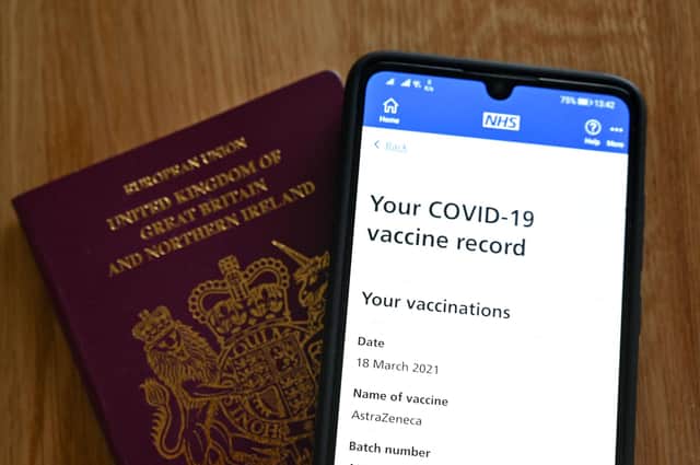 Covid vaccine 'passports' are increasingly required to travel abroad (Picture: Justin Tallis/AFP via Getty Images)