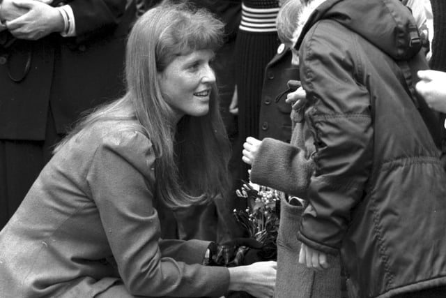 Sarah Ferguson, Duchess of York, chats to the children when she visits the Royal Blind School in Edinburgh, April 1989. 