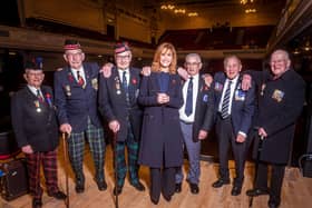 Bill Hall from Bonnyrigg (third from left) is pictured on stage with Jackie Bird and his fellow veterans.