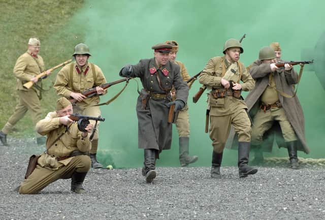 2010. Second World War event at Fort Nelson. Russian forces attack the Germans in a re-enactment. Picture: Will Caddy 101070-69