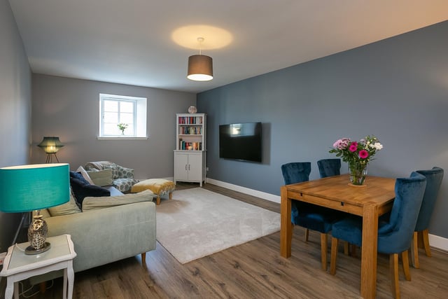 Tastefully finished, the open-plan living/dining room and kitchen feature a wall-mount TV point for the living area, ample space for dining, and a stylish fitted kitchen.