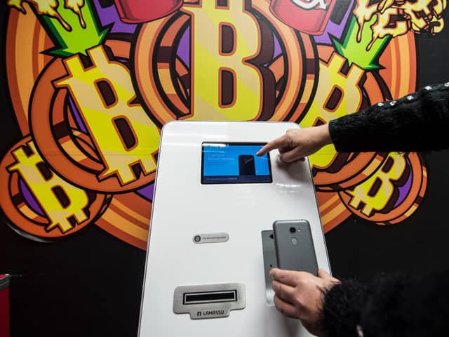 The Bitcoin cryptocurrency has even found itself into ATMs. Picture: John Devlin