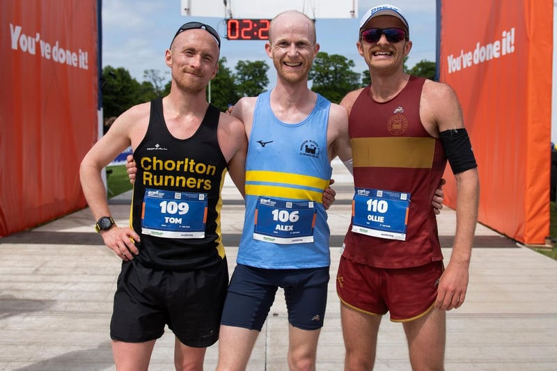 The fastest three men in the Edinburgh Marathon:  Alex Gladley  (02:21:34),  Tom Charles  (02:22:56)  and  Ollie Garrod  (02:24:01).