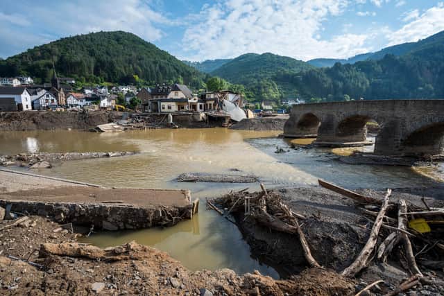Destroyed houses, roads and a bridge pictured after catastrophic flash floods hit Rech in Germany, other parts of the country and Belgium, killing scores of people (Picture: Thomas Lohnes/Getty Images)
