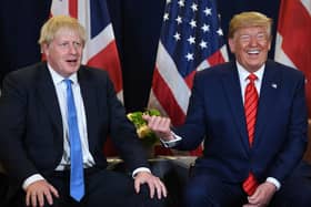 Boris Johnson, a bumbling officer class nincompoop, and Donald Trump,  a deranged conspiracy-theory-spouting bore, are otherwise respectively known as the UK Prime Minister and US President (Picture: Saul Loeb/AFP/Getty Images)