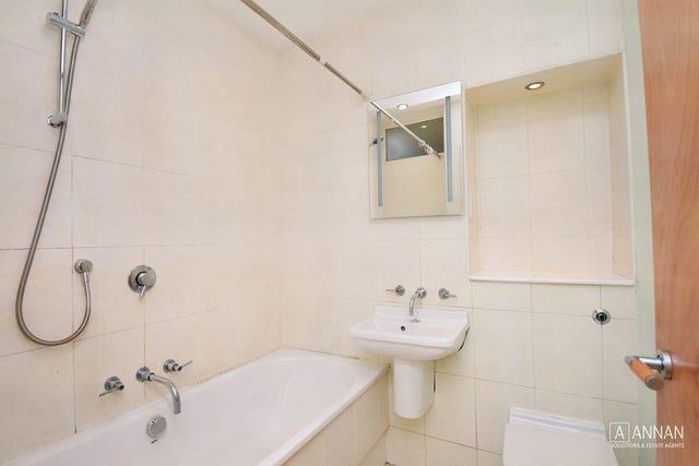 The tiled family bathroom with mains fed shower over bath.  Further benefits at this property include: double glazing; gas central heating and on-street parking.