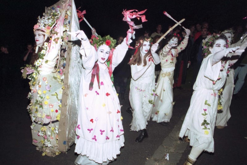The May Queen and her attendants dance on top of Calton Hill at the 1993 Beltane fire festival.