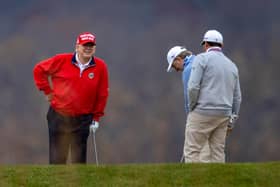 Donald Trump plays golf at the Trump National in Sterling, Virginia, on Friday (Picture: Tasos Katopodis/Getty Images)