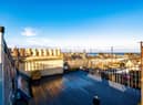 The spectacular fully decked roof terrace with panoramic views of Arthur‘s Seat, the Pentland Hills and the North Sea.