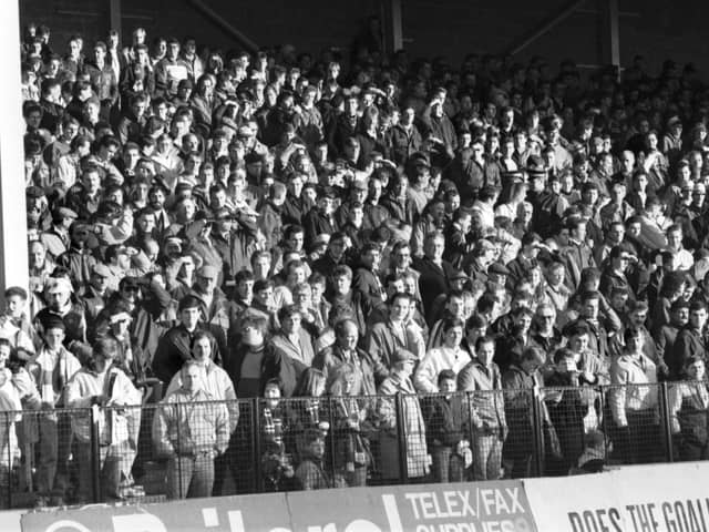 Football fans in the east terracing at Easter Road, the Hibs FC ground, in February 1990.