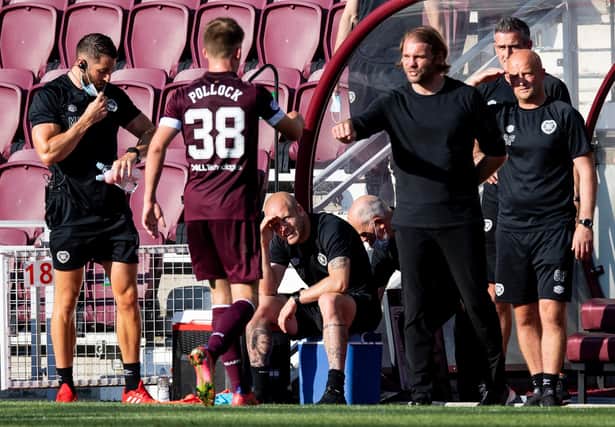 Finlay Pollock receives a congratulatory fist-bump from manager Robbie Neilson after being subbed off during the second half of Hearts' 1-0 victory over Inverness CT.