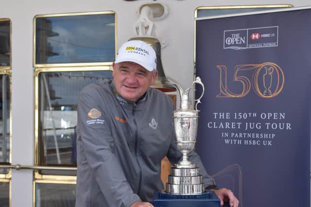 1999 winner Paul Lawrie with the Claret Jug on its visit to The Royal Yacht Britannia as part of a tour of UK. Picture: HSBC