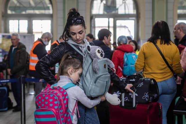 Millions of Ukrainians have been forced to flee their homes by Vladimir Putin's invasion (Picture: Wojtek Radwanski/AFP via Getty Images)