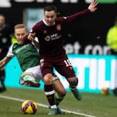 Jimmy Jeggo and Barrie McKay battle for possession during the last Edinburgh derby at Easter Road. Picture: SNS