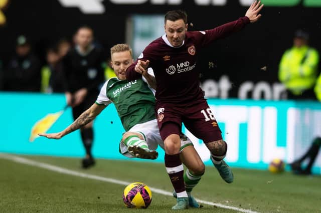 Jimmy Jeggo and Barrie McKay battle for possession during the last Edinburgh derby at Easter Road. Picture: SNS