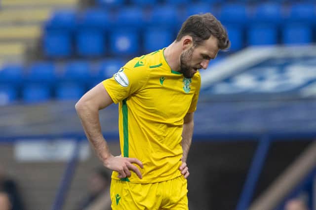 Christian Doidge looks dejected after Hibs pass up another chance in front of goal