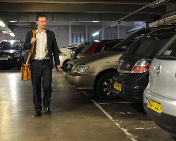 Work is to be halted on plans for a workplace parking levy in the Capital