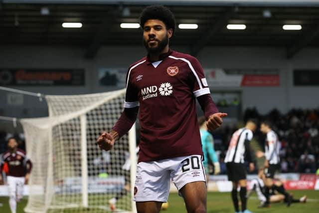 Ellis Simms celebrates after he comes off the bench to put Hearts in front
