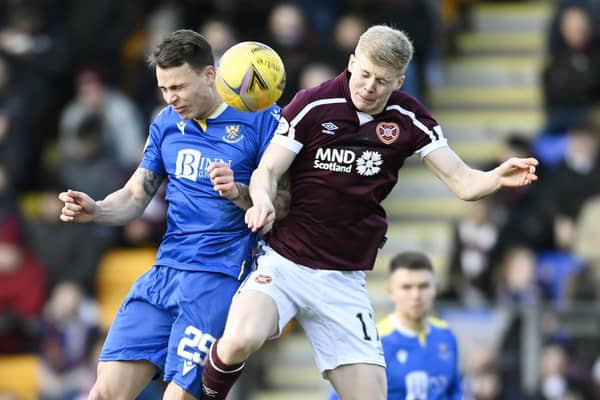Hearts defender Alex Cochrane, right, goes up against Melker Hallberg during St Johnstone's 2-1 win over Hearts in February. Picture: SNS