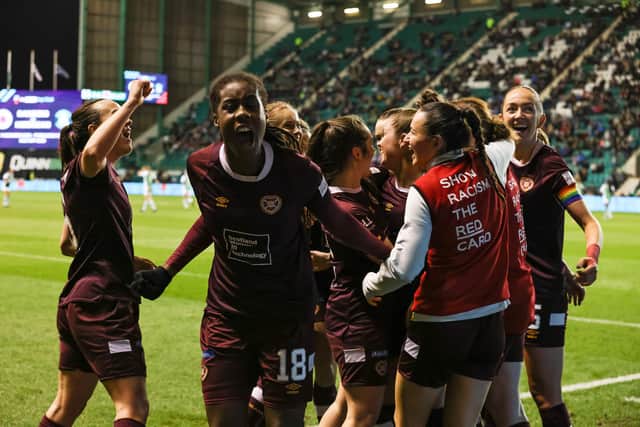 Vyan Sampson leads the celebrations after Emma Brownlie's header gave Hearts a second-half lead at Easter Road. Picture: Connor Mollison