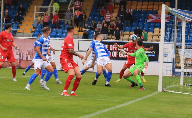 Kevin Smith opens the scoring for Bonnyrigg Rose away to Greenock Morton with a header at the back post. Picture: Joe Gilhooley LRPS