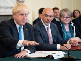 Boris Johnson and Nadhim Zahawi seen duing a Cabinet meeting last year (Picture: Stefan Rousseau/WPA pool/Getty Images)