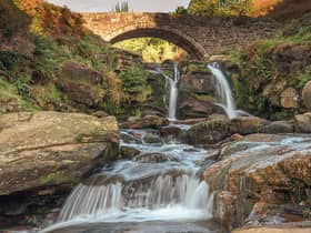 Three Shires Head. A waterfall and packhorse stone bridge at Three Shires Head in the Peak District National Park.