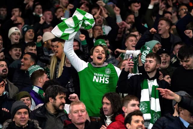 Hibernian fans celebrate during the Premier Sports Cup semi-final match at Ibrox Stadium, Glasgow. (Picture: Andrew Milligan/PA Wire).