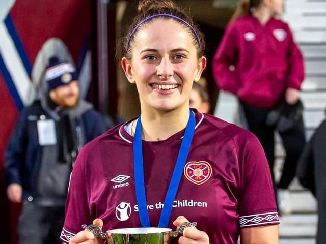 Danni McGinley with the SWPL2 trophy after Hearts' league win in 2019. Credit: Hearts Women