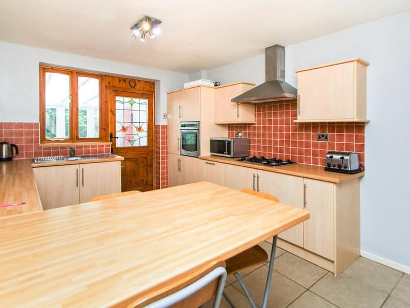 The breakfast kitchen has an internal door and window, with a range of wall, drawer and base units. Not to mention a built-in oven, gas hob with extractor over, integrated fridge and and breakfast bar.
