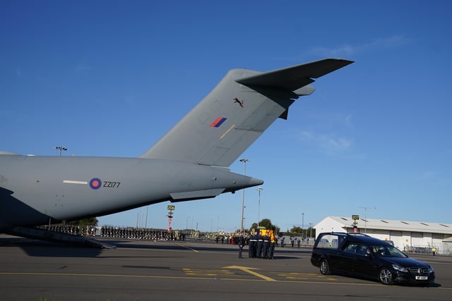 The coffin of Queen Elizabeth II at Edinburgh Airport from where it will be flown by the RAF on its journey from Edinburgh to Buckingham Palace, London, to lie at rest.
