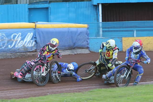 Monarchs guest Greg Blair slides off his bike in heat two while Jacob Hook, red helmet, goes up the inside. Picture: Jack Cupido.