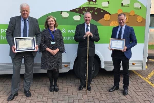 From left to right: Willie Stewart, Prof Julie Fitzpatrick (Chief Executive of the Moredun Foundation, Scientific Director of the Moredun Research Institute, and Chief Scientific Advisor for Scotland), Gareth Baird (Chairman of the Moredun Foundation) and Gareth Jones. They are standing in front of Moredun's brand new mobile laboratory and outreach bus, built in honour of their Centenary year.