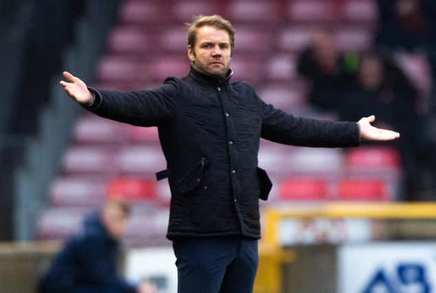 Robbie Neilson says he is baffled by the decision to stop Hearts training.