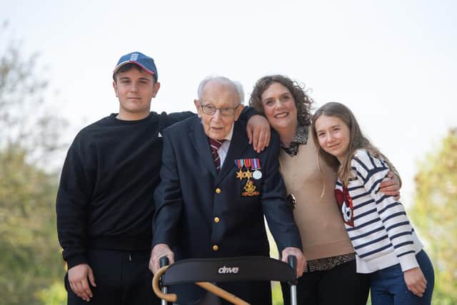 Then 99-year-old war veteran Captain Tom Moore, with (left to right) grandson Benji, daughter Hannah Ingram-Moore and granddaughter Georgia.