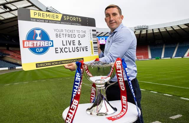 Former Hibs boss Alan Stubbs helps to launch Premier Sports' partnership with the Betfred Cup. Picture: SNS