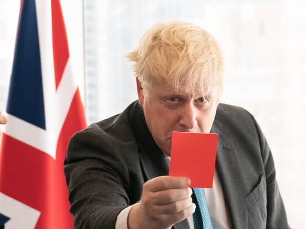 Boris Johnson should show himself the red card (Picture: Stefan Rousseau/PA)