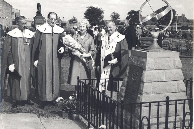 Loanhead dignitaries at the sundail which was unveiled by The Queen in the Memorial Park during the royal visit in June, 1961. Photo courtesy Midlothian Council Local Studies