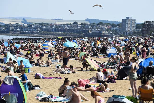 Portobello Beach was packed yesterday afternoon, with temperatures hitting 30C in Edinburgh. Picture: Lisa Ferguson